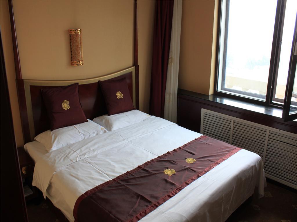 Baotou West Lake Hotel Номер фото